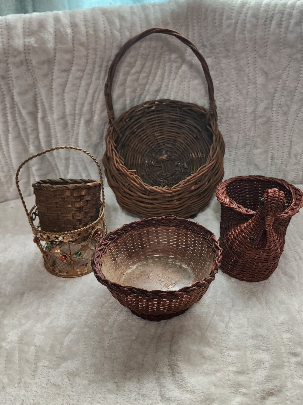 4 Wicker Baskets, Various sizes.